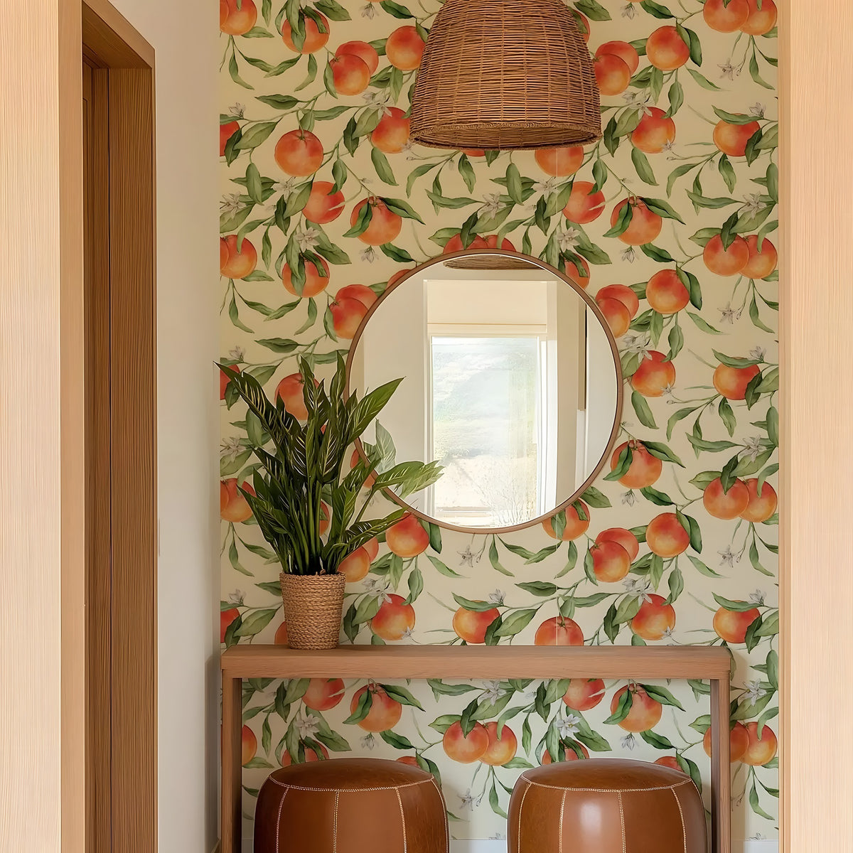 Room interior with peach-themed wallpaper, round mirror, and brown stools.