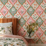 Bedroom with floral wallpaper, bed, and table with flowers.