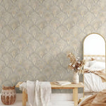 Room interior with decorative wallpaper, wooden bench, and mirror.