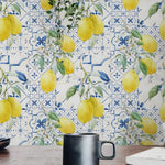 Wallpaper with lemon and floral design on a tiled background