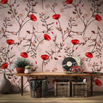 Room interior with floral wallpaper, wooden table, and decorative items.