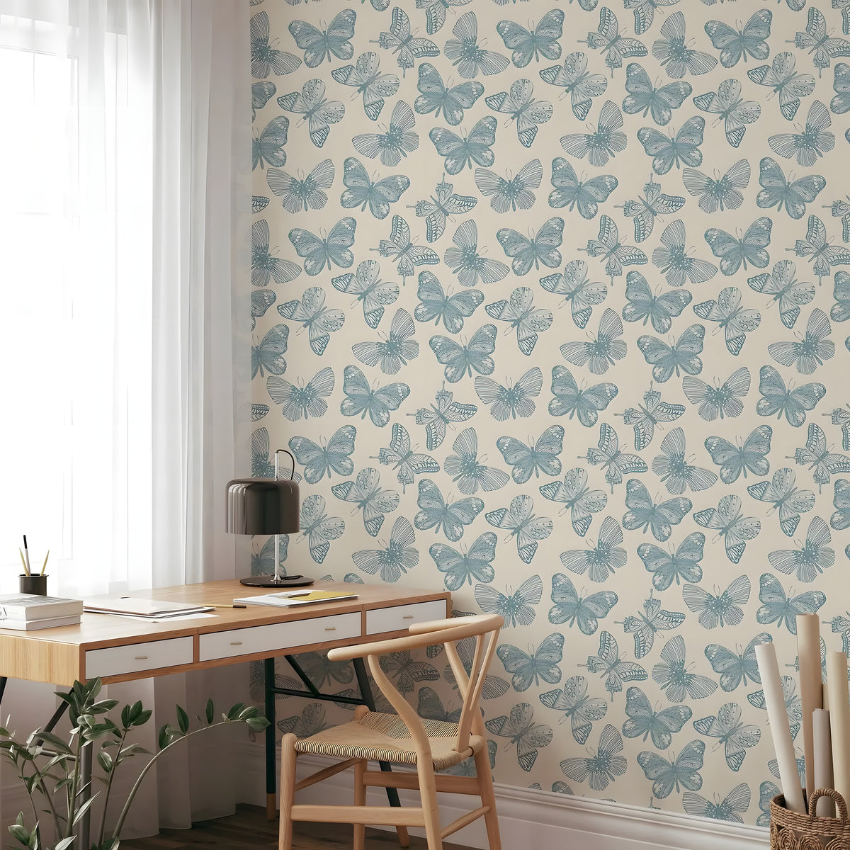 Wallpaper with butterfly pattern in a room with a desk and chair.