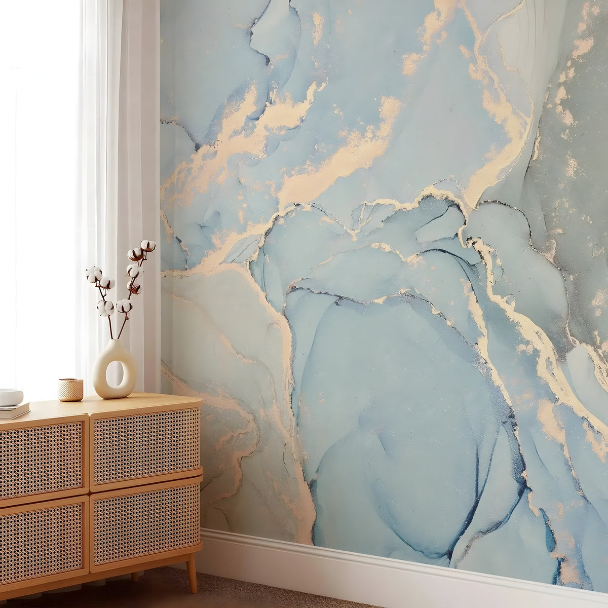 Room interior with abstract blue and gold wall mural and wooden cabinet.