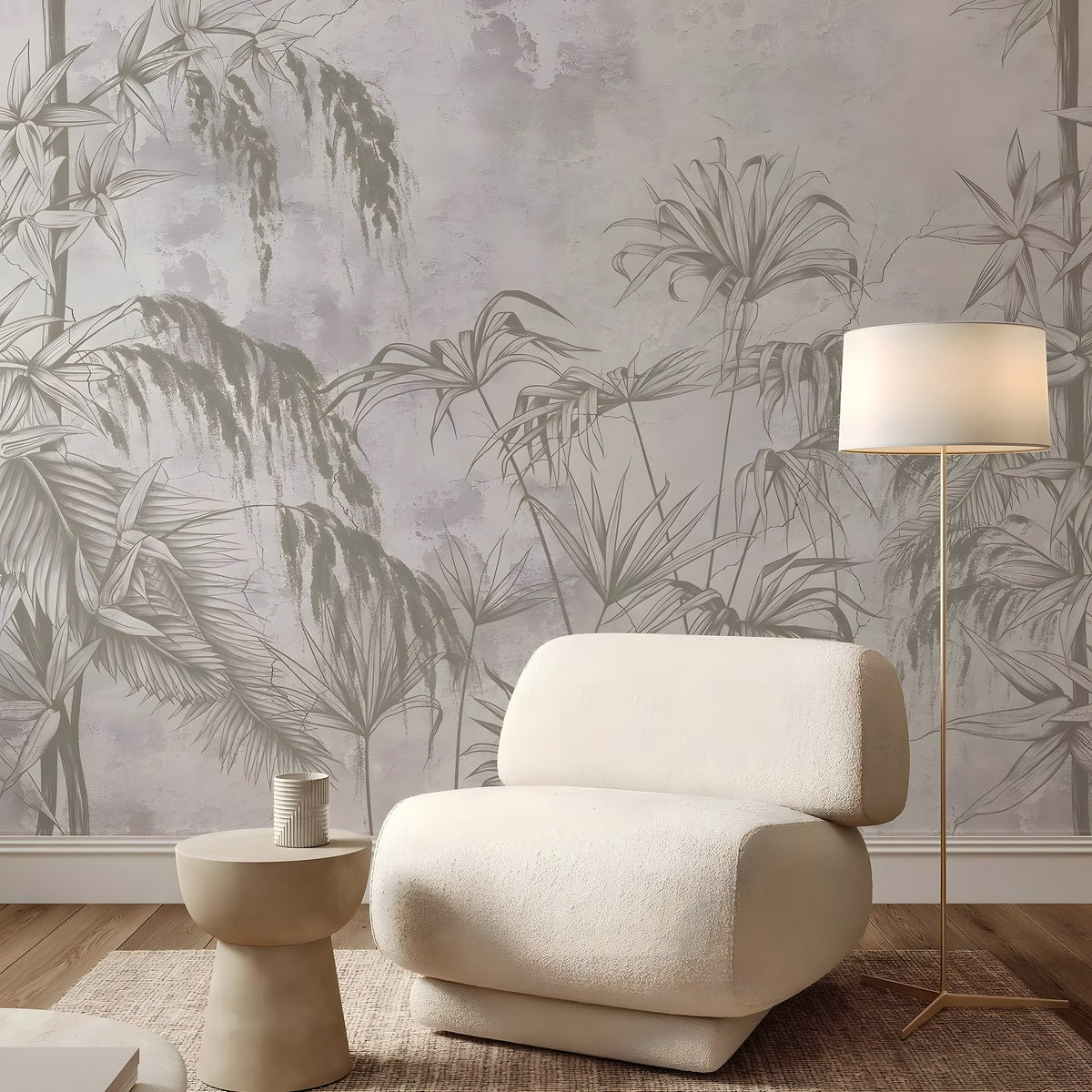 Beige armchair in a room with tropical leaf wallpaper and a floor lamp.