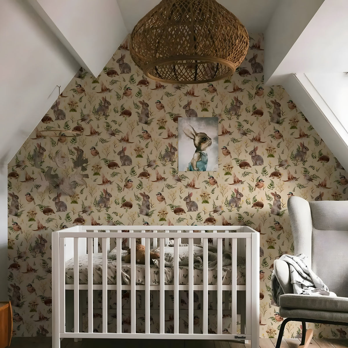 Nursery room with crib, patterned wallpaper, and framed picture.