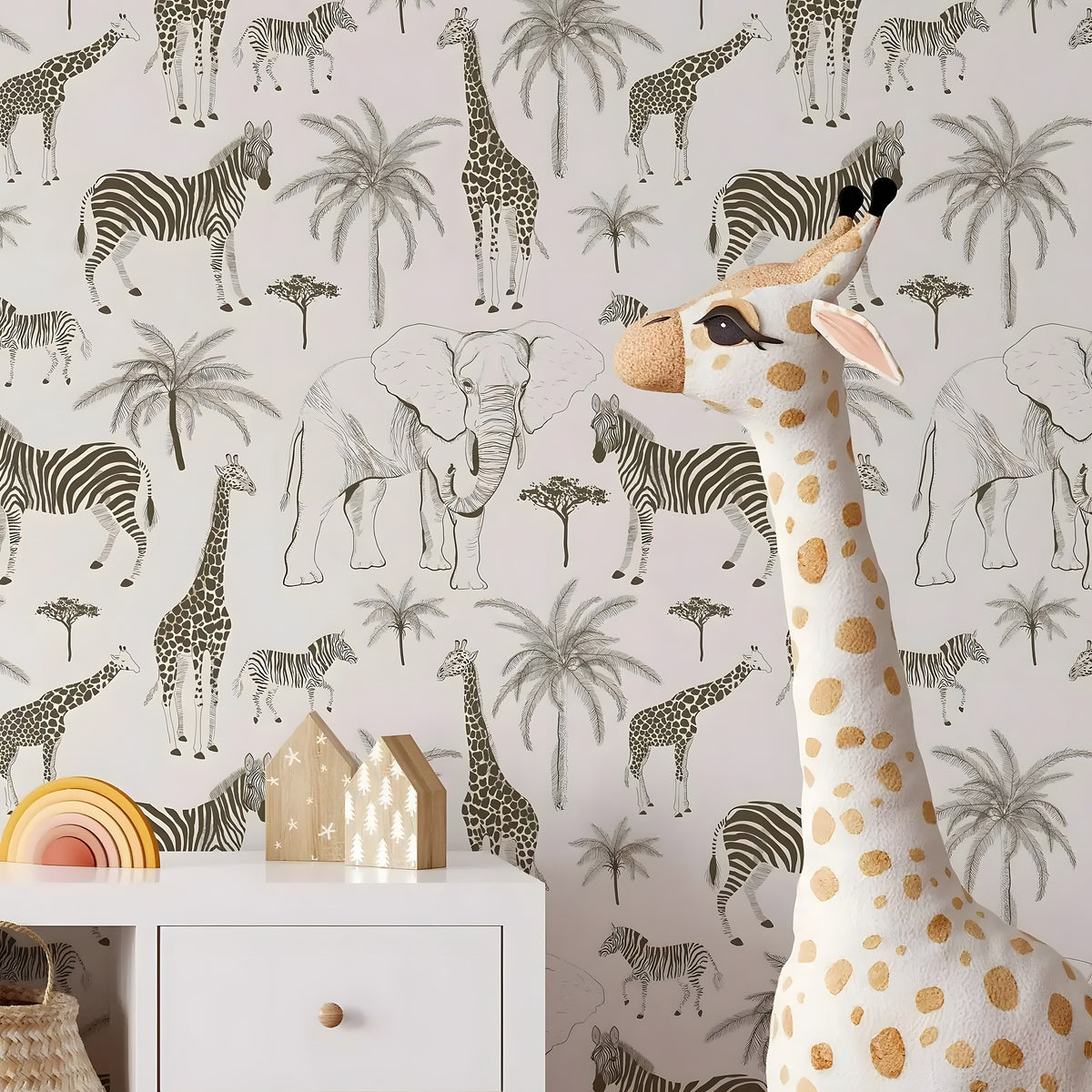Plush giraffe toy in front of a wallpaper with animal patterns