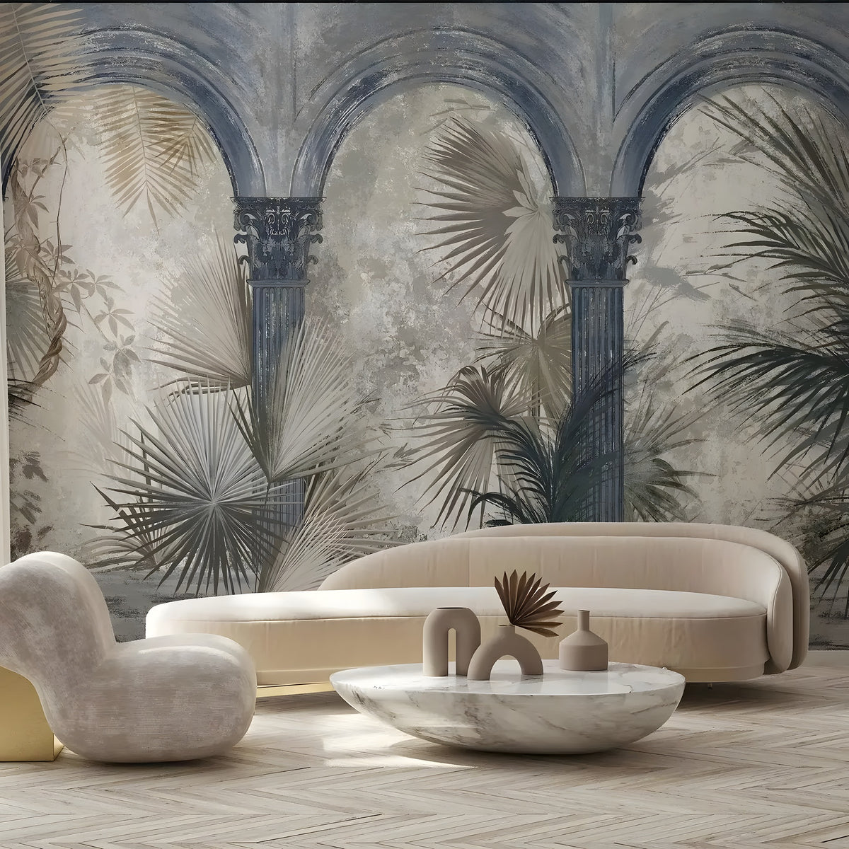 Modern living room with beige sofa, armchair, and decorative table against a tropical wall mural.