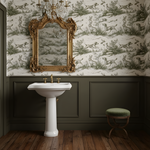 Bathroom with ornate mirror, white pedestal sink, and patterned wallpaper.