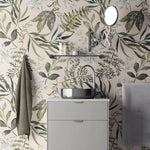 Bathroom with floral wallpaper, sink, and towel