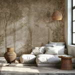 Living room with a large sofa against a wall with tree mural, wicker lamp, and side table.