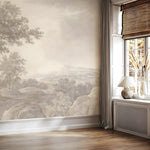 Room interior with landscape wallpaper and a window with a lamp and decorative items.