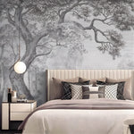 Modern bedroom with large tree mural on the wall