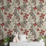 Wallpaper with monkey and floral pattern in a room with a white sofa and decorative items.