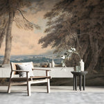 Room with a scenic wall mural, wooden chair, and small table.