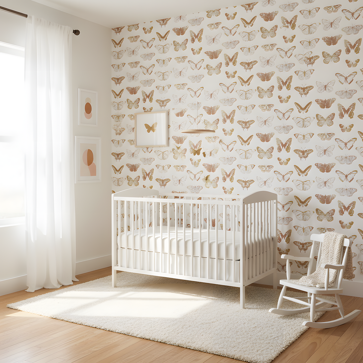 Nursery room with white crib and rocking chair against a butterfly-patterned wall.