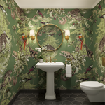 Bathroom with jungle-themed wallpaper, sink, and toilet.