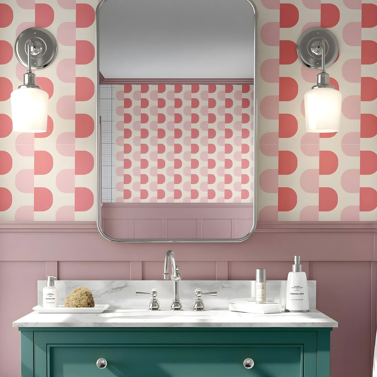 Bathroom with pink geometric wallpaper, green vanity, and white sink.