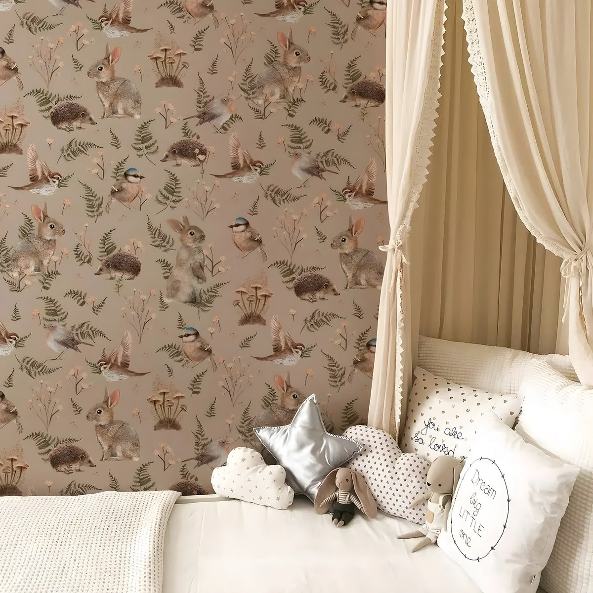 Bedroom with animal-themed wallpaper and decorative pillows on a bed.