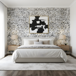 Modern bedroom with abstract art on a patterned wall