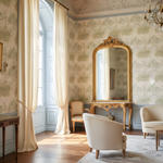 Luxurious interior of a room with ornate wallpaper, a large mirror, and elegant furniture.
