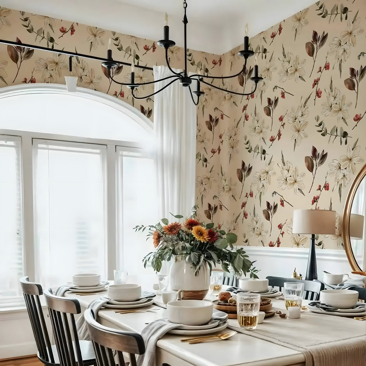 Dining room with floral wallpaper, table set for a meal, and decorative elements.