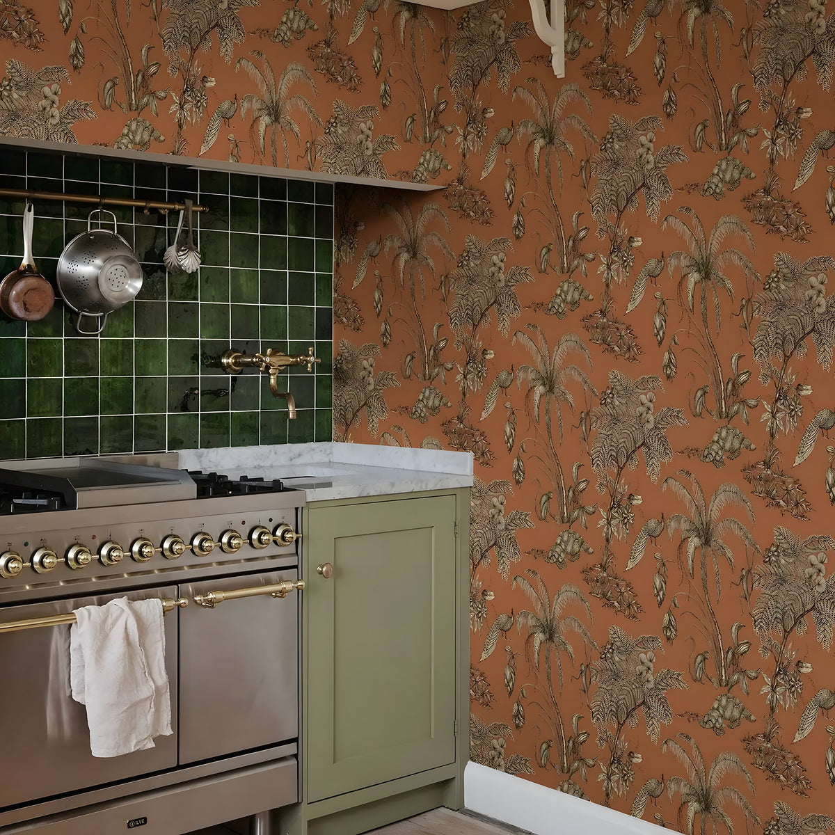 Kitchen with floral wallpaper, green tiled wall, and stainless steel stove.