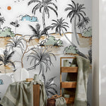 Tropical-themed wallpaper with palm trees and beach scene in a bathroom setting.