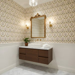 Decorative wallpaper with a floral pattern on a wall.