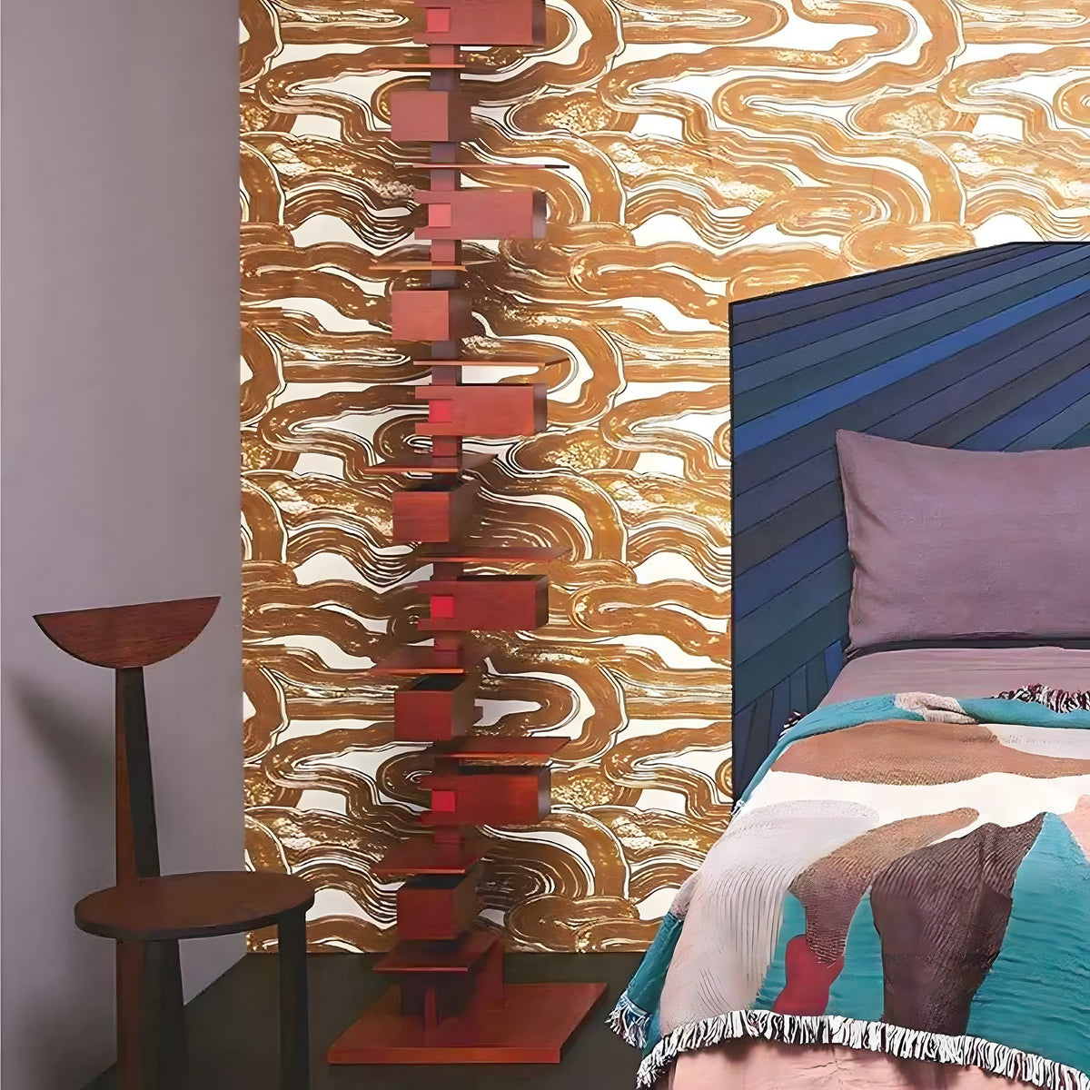 Room interior with abstract wall art and colorful bedding.