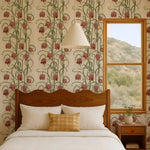 Bedroom with floral wallpaper, wooden headboard, and window view of mountains.