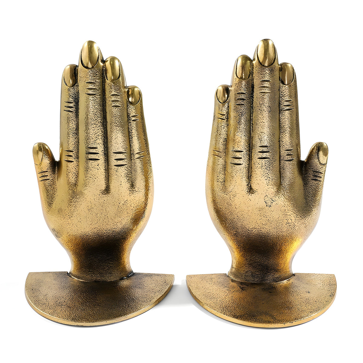 Pair of gold hand sculptures on a white background