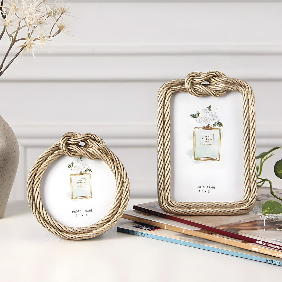 Two decorative photo frames with rope designs on a surface.
