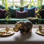 Solid Brass Hippo Figurine styled in a room setting
