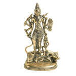 A brass Lord Hanuman statue standing on a bull, holding a shield and trident, set against a plain white background.