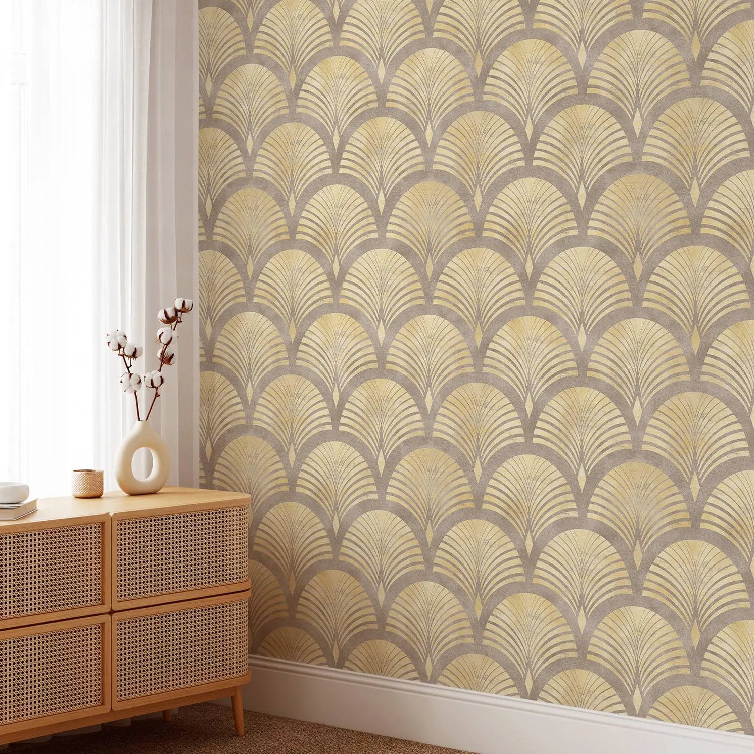 Room interior with a wooden sideboard and decorative items against a wall with geometric patterned wallpaper.