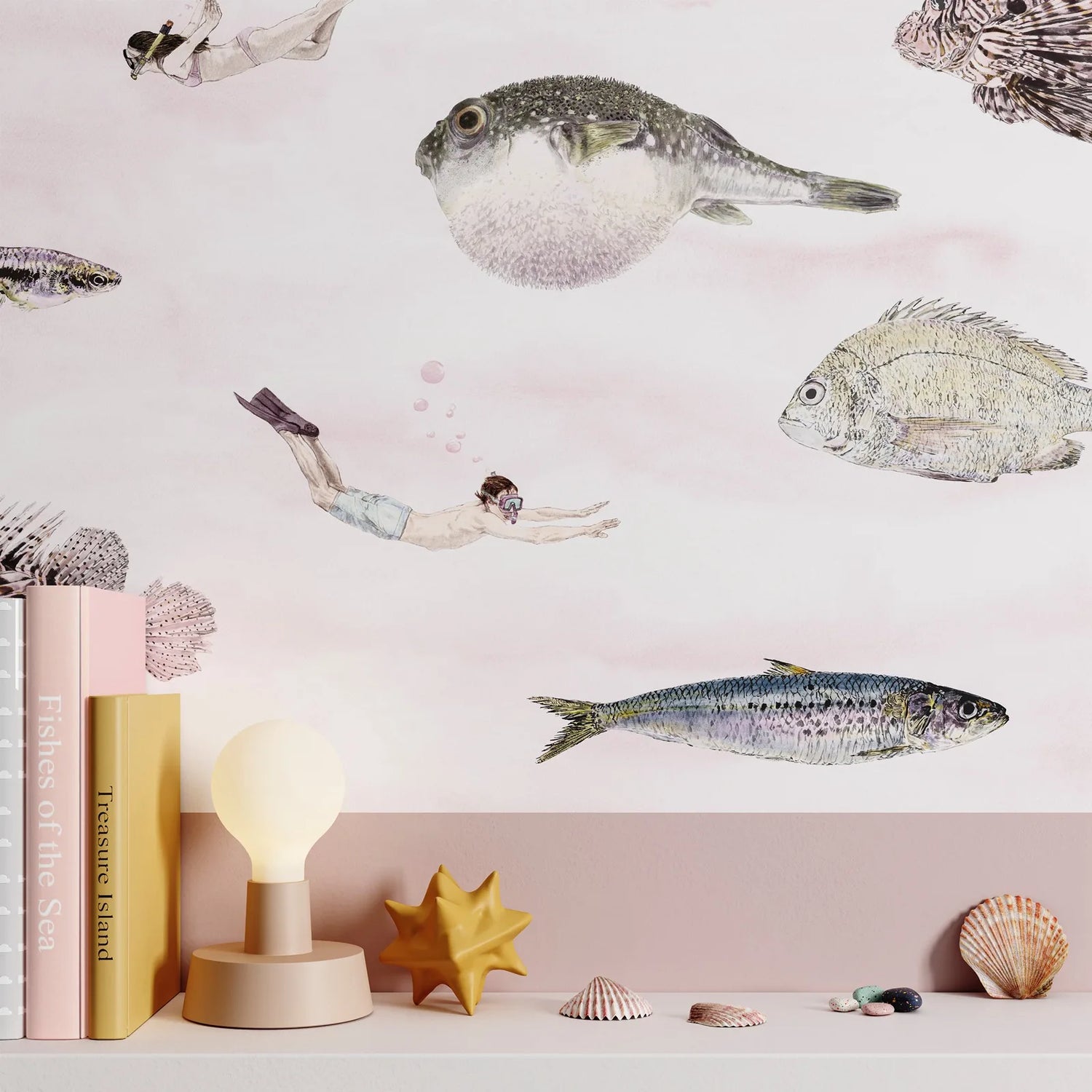 Wallpaper with fish illustrations on a wall with decorative items below.