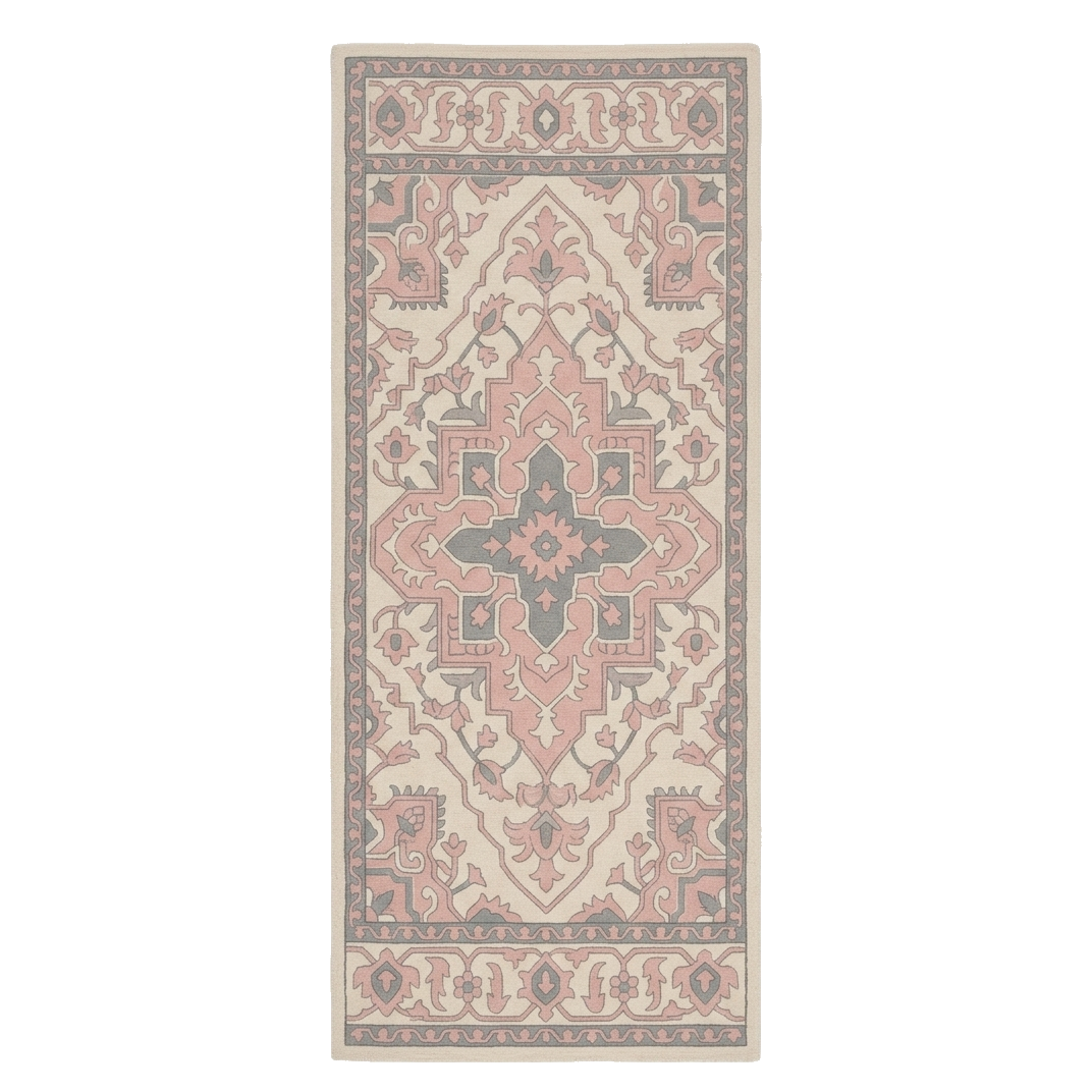 A rectangular area rug with a traditional ornamental medallion pattern in dusty pink, beige, and muted gray tones, shown flat against a plain white background.