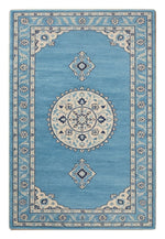 Azure Pendant Medallion Hand Tufted Rug — blue, light blue, cream traditional rug by Maia Homes on a white background