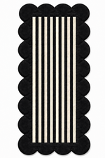 Rectangular rug with scalloped black border and vertical white stripes 
