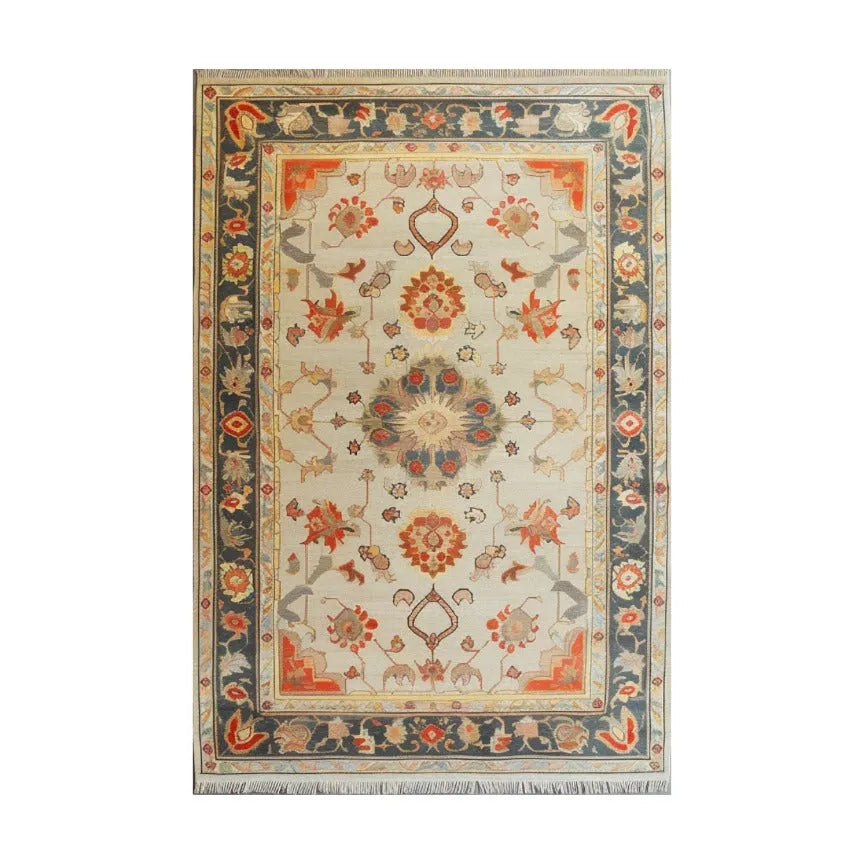  Blossom Breeze Hand Knotted Area Rug, a delightful piece that captures the essence of spring with its vibrant floral patterns. This rug combines artisanal craftsmanship with a fresh, airy design, adding a lively touch to any room.