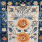 Blue Blossom Edge Medium Hand Knotted Wool Rug