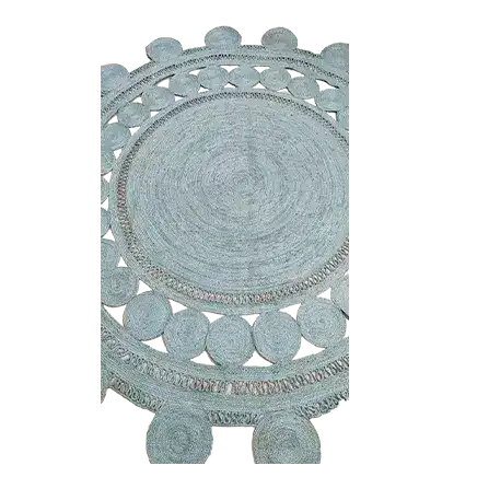 Beautifully crafted Blue Circle of Life Round Jute Rug showcasing intricate patterns, ideal as an area rug for a formal dining room. This elegant round rug combines durability with style, adding a touch of sophistication to dining room spaces.