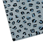Close-up view of a blue leopard print hand tufted wool area rug, perfect for large living room spaces. The intricate design features bold black and blue patterns on a soft grey background, highlighting the luxurious texture of this living room wool rug.
