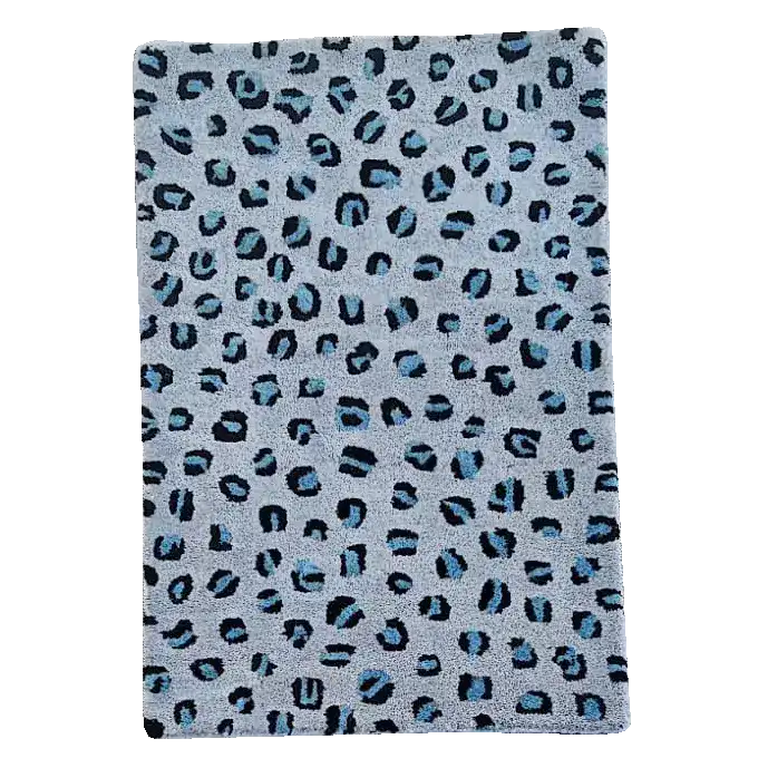 Stylish Blue Leopard Print Hand Tufted Wool Area Rug, perfect for enhancing large living room spaces with its bold pattern and soft texture.