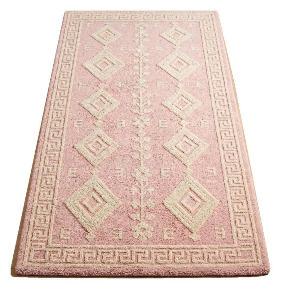 Blush Keystone Lattice Hand Tufted Wool Rug — pink, cream, ivory tribal rug by Maia Homes on a white background