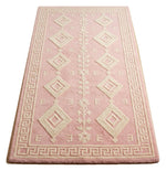 Blush Keystone Lattice Hand Tufted Wool Rug — pink, cream, ivory tribal rug by Maia Homes on a white background