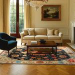 Elegant living room featuring a Branching Journeys Hand Knotted Area Rug with intricate floral patterns in rich colors, perfectly complementing the classic decor. This 8x10 vintage Persian rug serves as a luxurious centerpiece for area rugs in living rooms, enhancing the cozy ambiance.