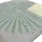 Light green hand-tufted wool area rug featuring a round design with butterflies over a flower pattern, perfect for adding a touch of elegance to your living room or office space.