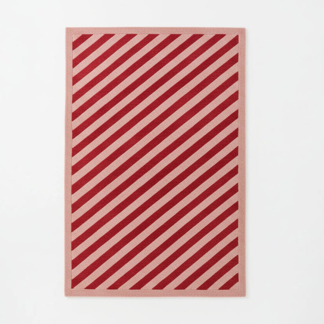 Candy Everyday Hand Tufted Wool Rug rug with a striped pattern on a white background