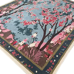 A beautiful Cherry Grove Serenity Hand Tufted area rug, perfect for enhancing any living room. The wool rug features a vibrant design with cherry blossom trees against a serene blue background, ideal for those seeking large living room rugs with artistic flair.